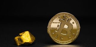 round gold-colored bit coin